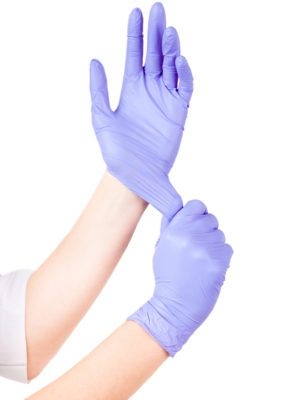 Woman doctor hands in medical gloves isolated